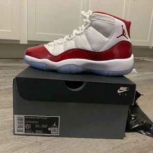 Air Jordan 11 Cherry .
December 2022 Release .
BRAND NEW . 
Authentic .